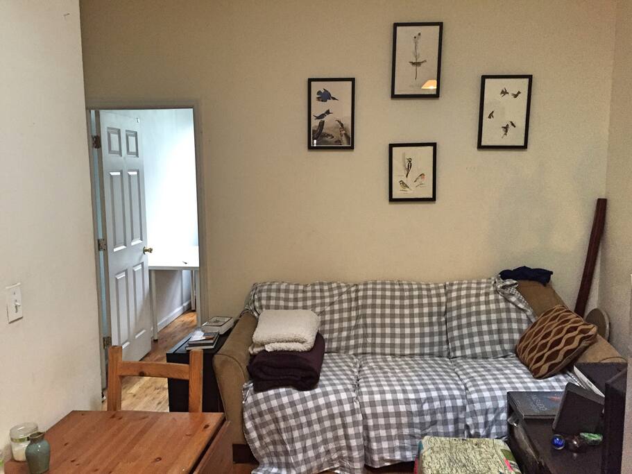 The entrance to your room is the door on the left.