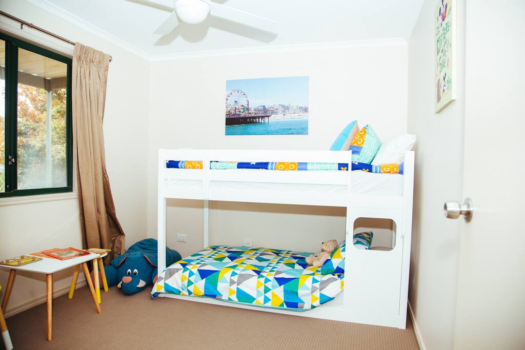 Third bedroom has low-line bunks - Up to a 12 yr old on the top and can sleep a teenager bottom bed