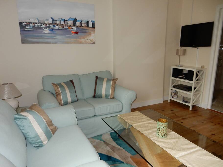 Lounge area with satellite TV & blue ray DVD player