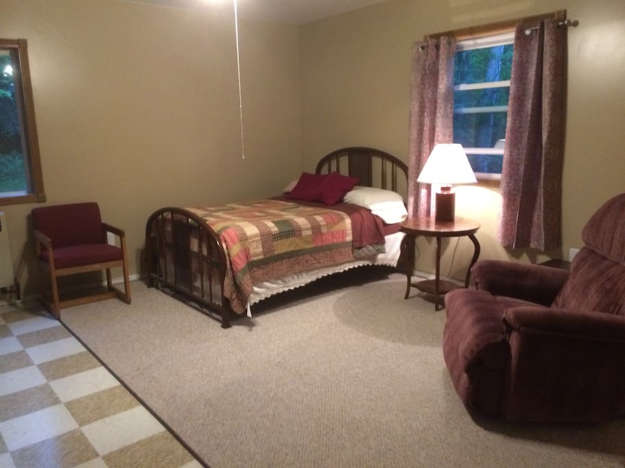 Bedroom has 1 full size, 1 twin and recliner