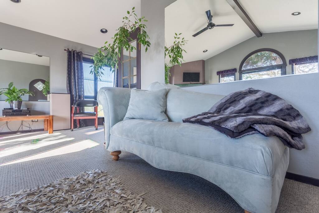 Chaise lounge and hi-fidelity stereo system.
