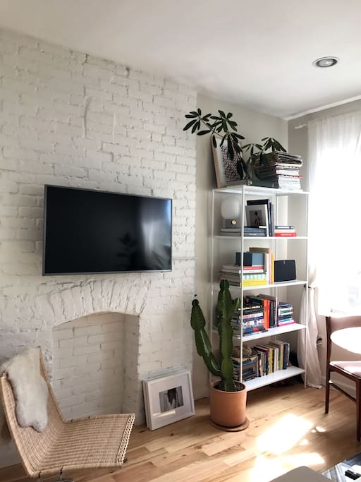 Apple TV, Sonos Speakers, Exposed Brick Fireplace