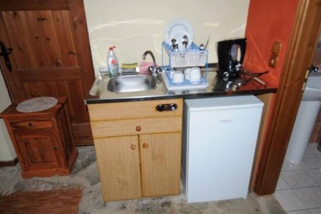 The kitchenette and the 120lt fridge with freezer.
