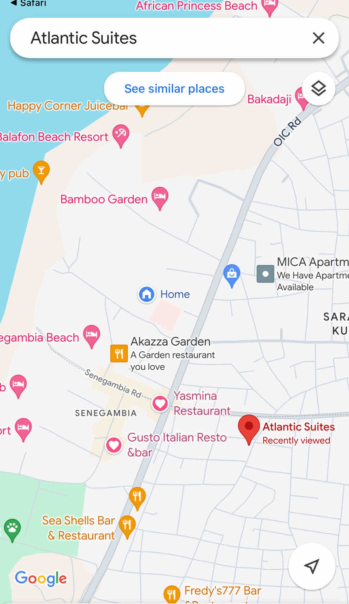 The map highlights the location of Atlantic Suites, positioned near key landmarks, including nearby restaurants and the beach. The surrounding area is visually identified with iconic symbols representing restaurants and attractions, emphasizing accessibility to various amenities within a short distance.