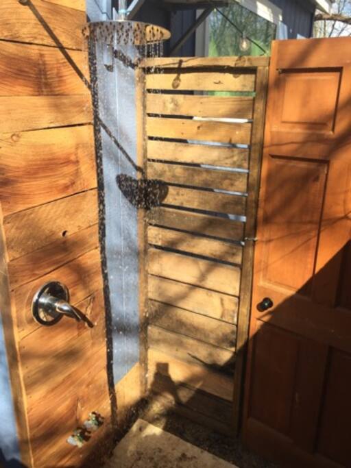 Outdoor shower with hot and cold water.