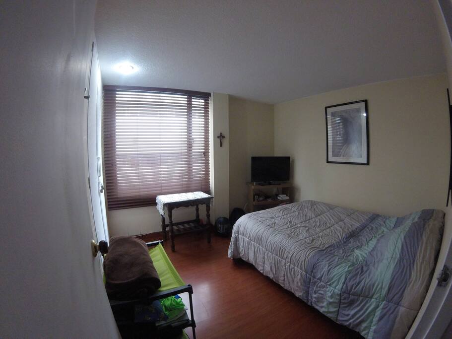 Double bed, closet, little table, Tv with lots of channels, Netflix and Playstation3.