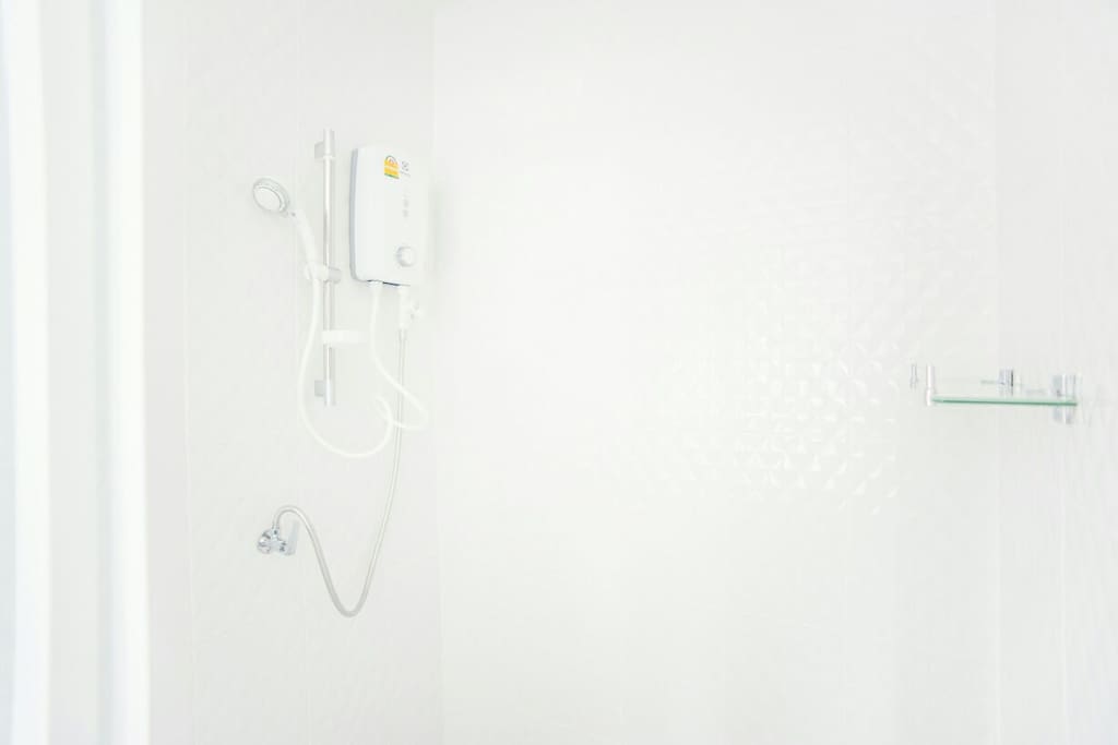 hot water shower, In bathroon it has clear partition to separate fry zone and wet zone.