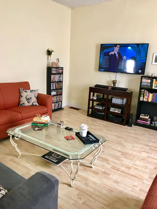 60" tv with access to Netflix, HULU & we also have a load of dvds that can be played in the Blue Ray player. Feel free to grab a book if you'd like.