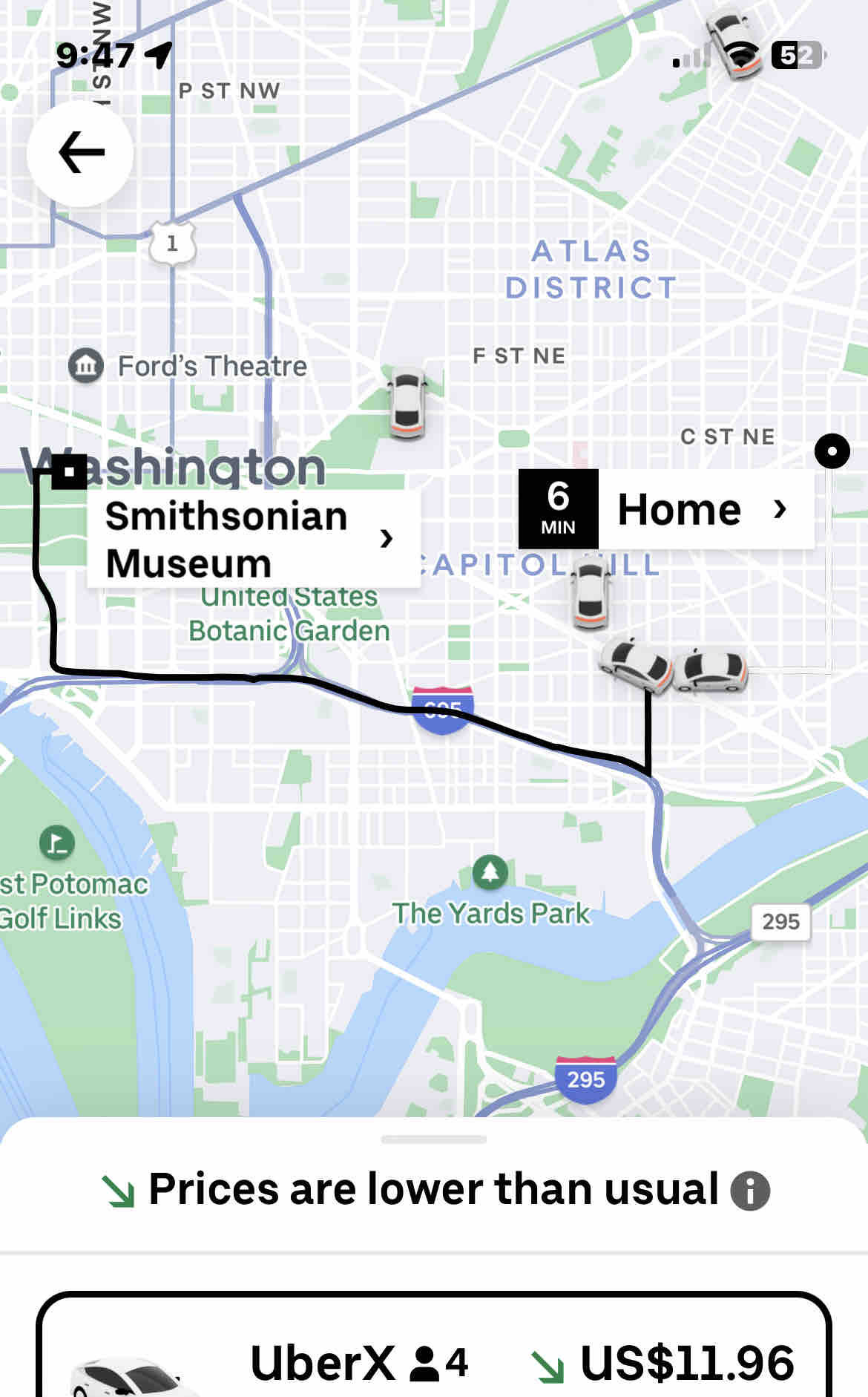 A map displays various locations in Washington, D.C., including the Smithsonian Museum and the listing's home. Multiple vehicle icons indicate ride-sharing options along with the estimated travel time of six minutes. The surrounding area is depicted with streets and green spaces.