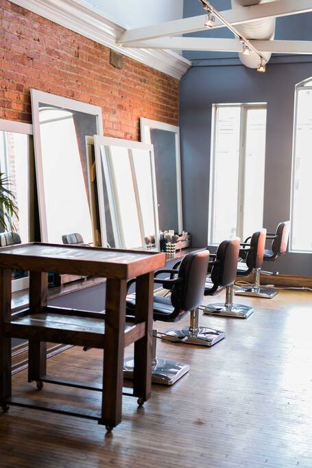 Chair/products will be removed for events left with banquette seating and large mirrors and exposed brick.