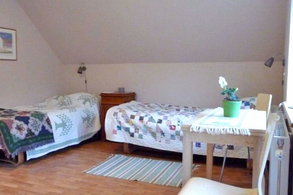 Comfortable beds in guest room.