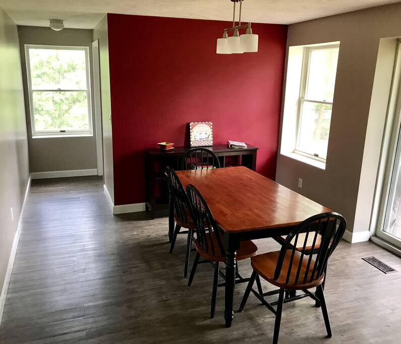 Large dining area with sliding door to back deck.