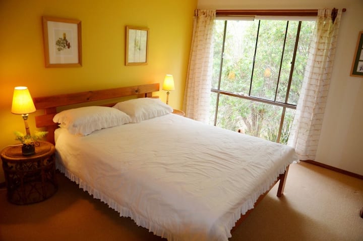 The Banksia Room - upstairs double bedroom with queen-sized bed and ensuite