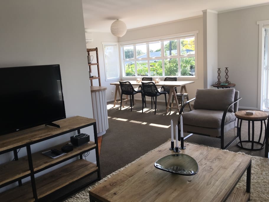 Open plan lounge, dining, kitchen opening to gorgeous decks with views. Elevated on 2nd floor