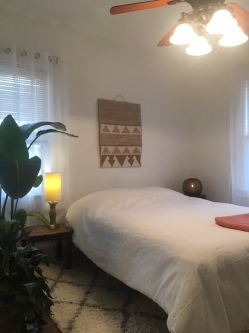 Queen Size Bed, lots of natural light.