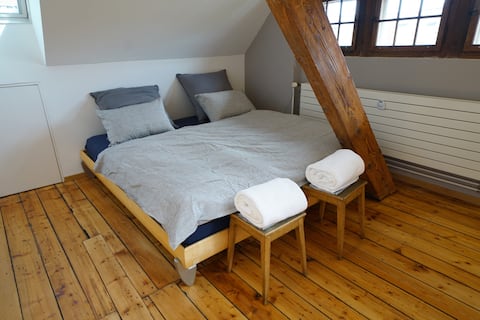 Central studio above the roofs of Basel