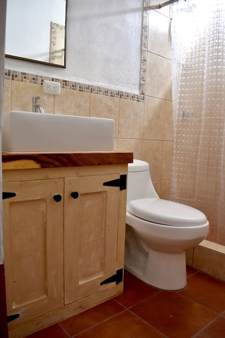 Private bathroom with hot water.