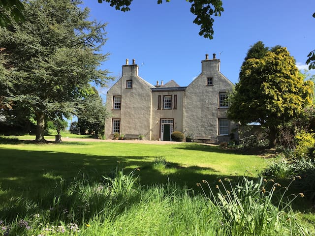 Beautiful old manse set in a spectacular garden