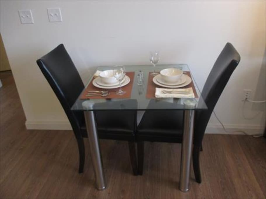 Dining area with seating for two where you can dine in comfort