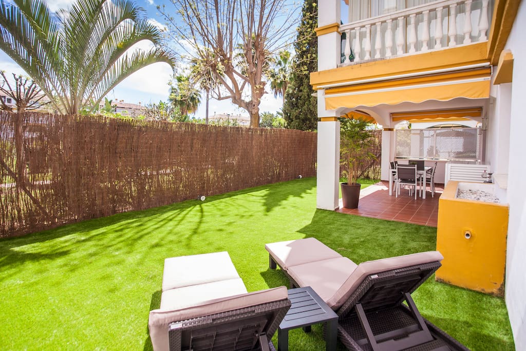 Private garden with sun loungers