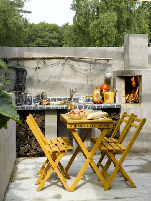Outdoor kitchen and fireplace