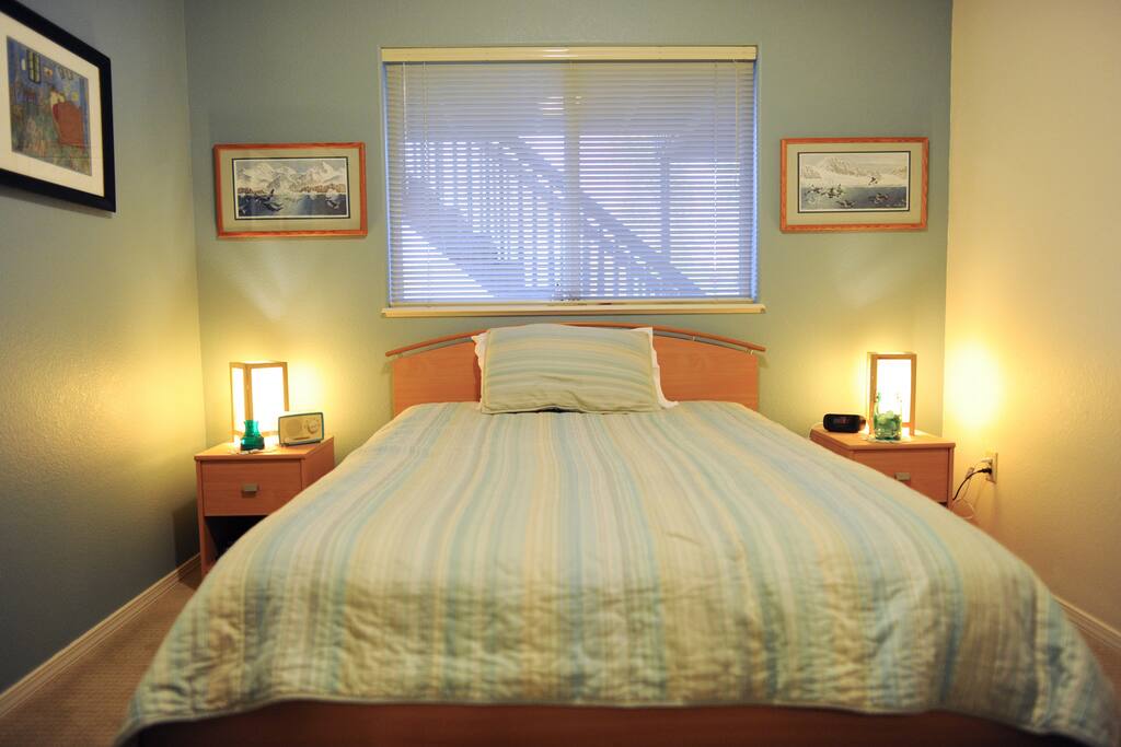 Full size bed ready for a couple or a single.