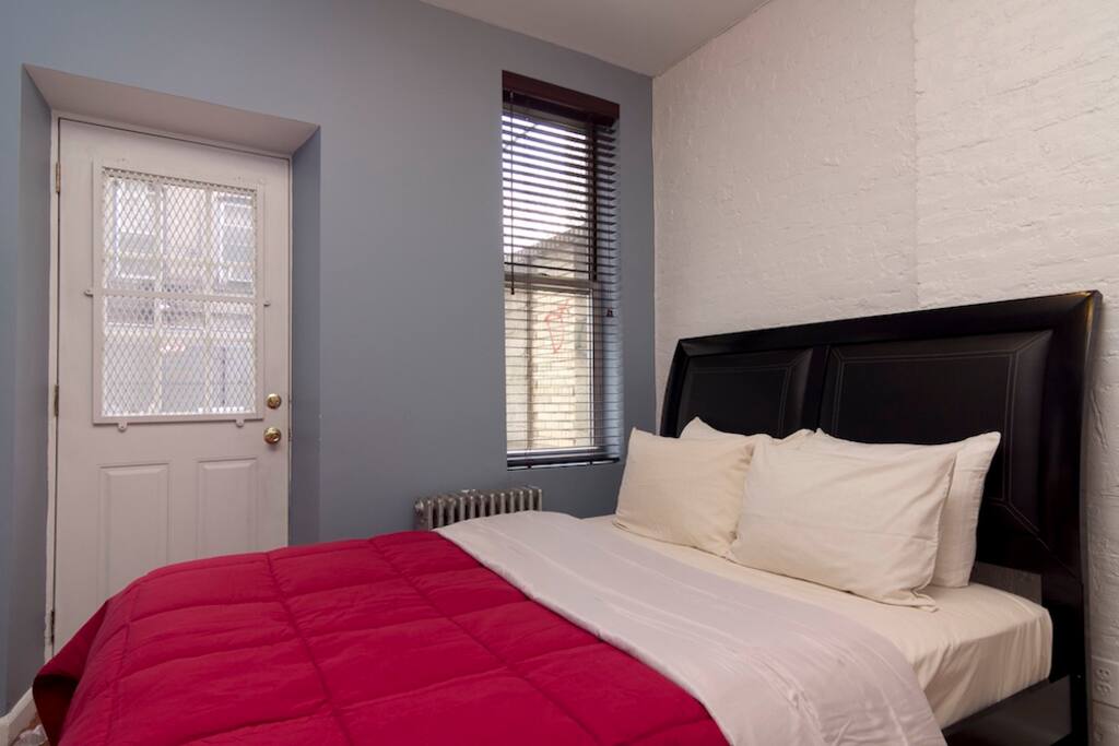 Queen Bedroom with door to outdoor space