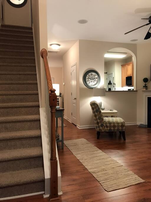 Walking in through the front door.