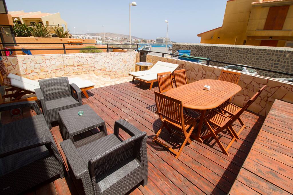 terrace with side sea views