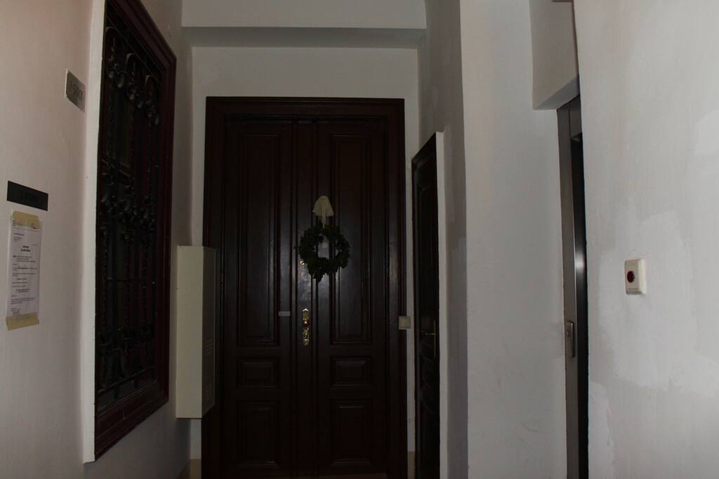 Entrance directly besides the elevator (: