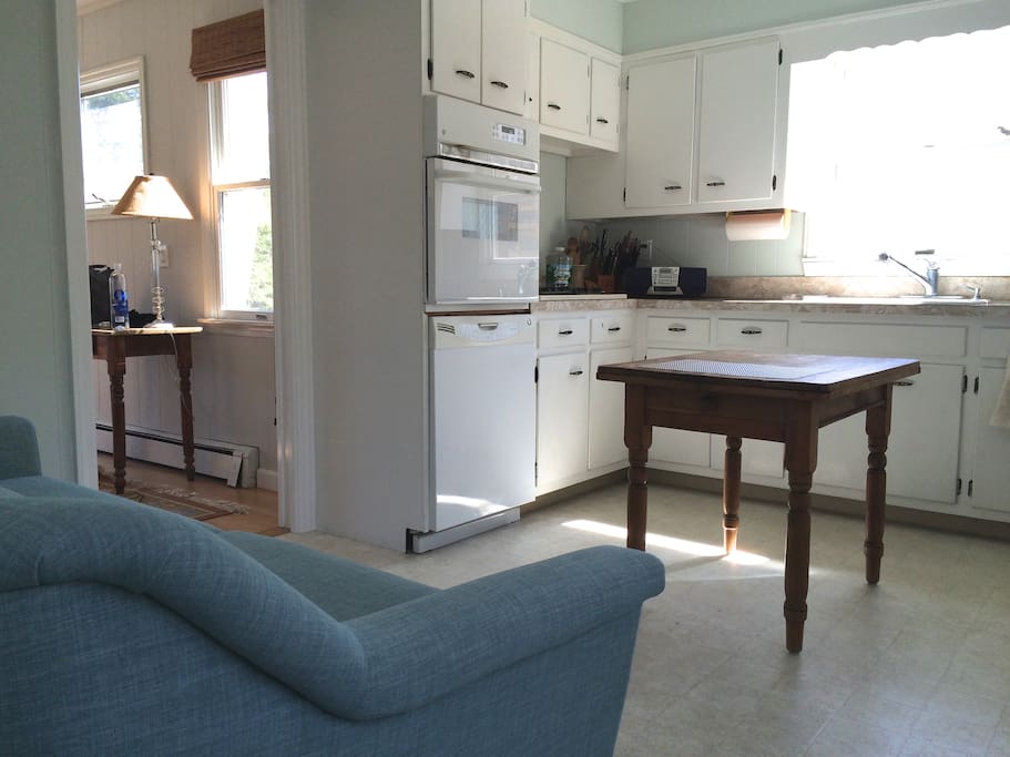 Sunny kitchen with couch