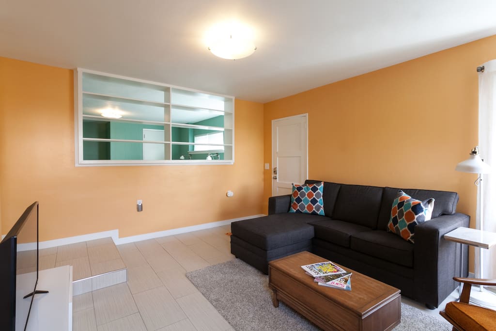 Comfy living room with queen sleeper sofa.