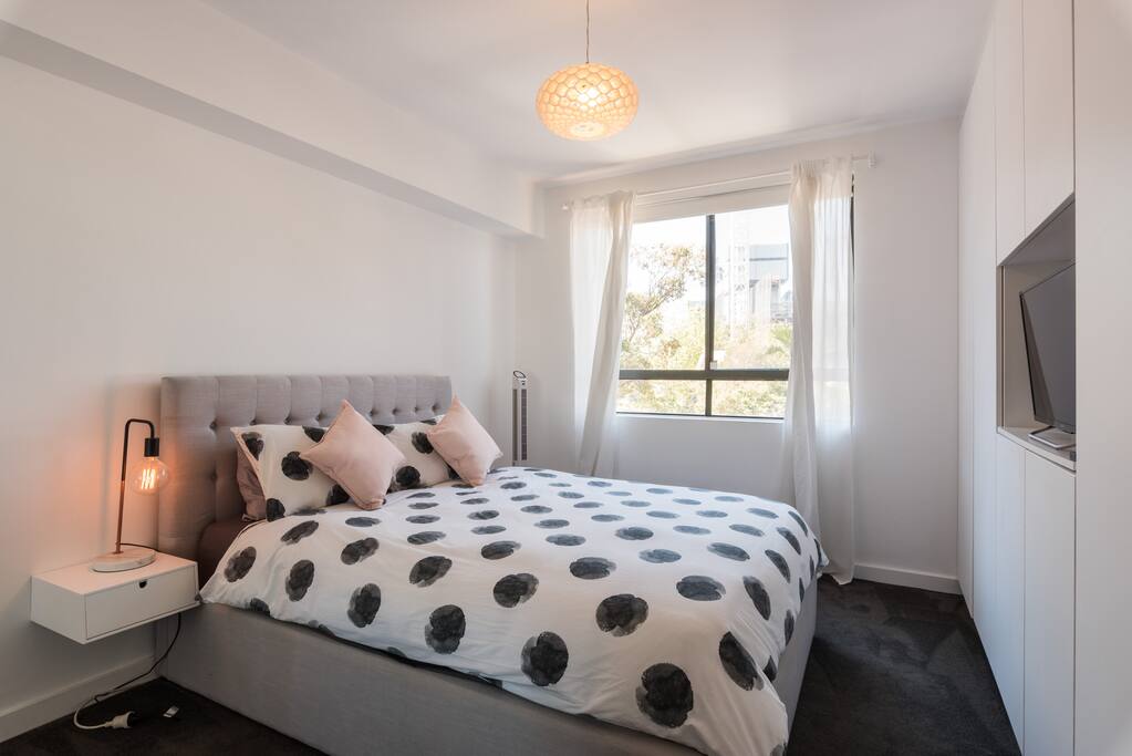 Bedroom - Queen bed, TV, Natural light and block out curtains