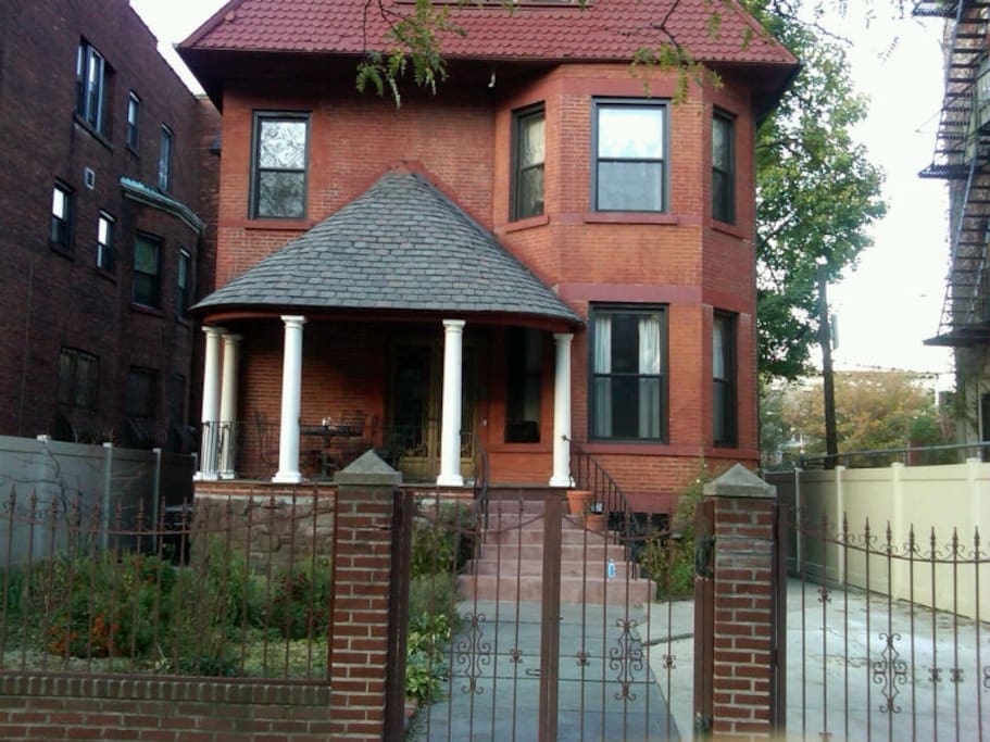 Front of house. The top floor isn't in the picture. There is a dining area on porch.