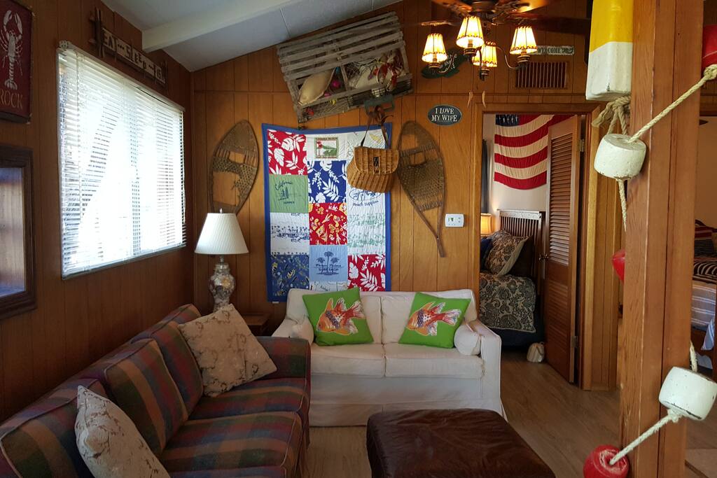Cozy with lots of seating to enjoy DirectTV or wood burning fireplace