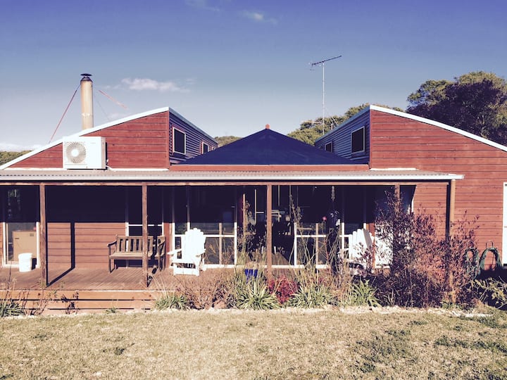 Sit and enjoy the northern sun on the side verandah