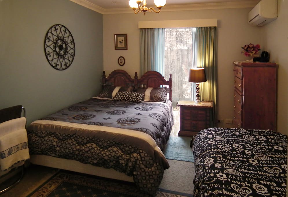QUEEN BED AND A SINGLE one TO ACCOMMODATE 3 GUESTS