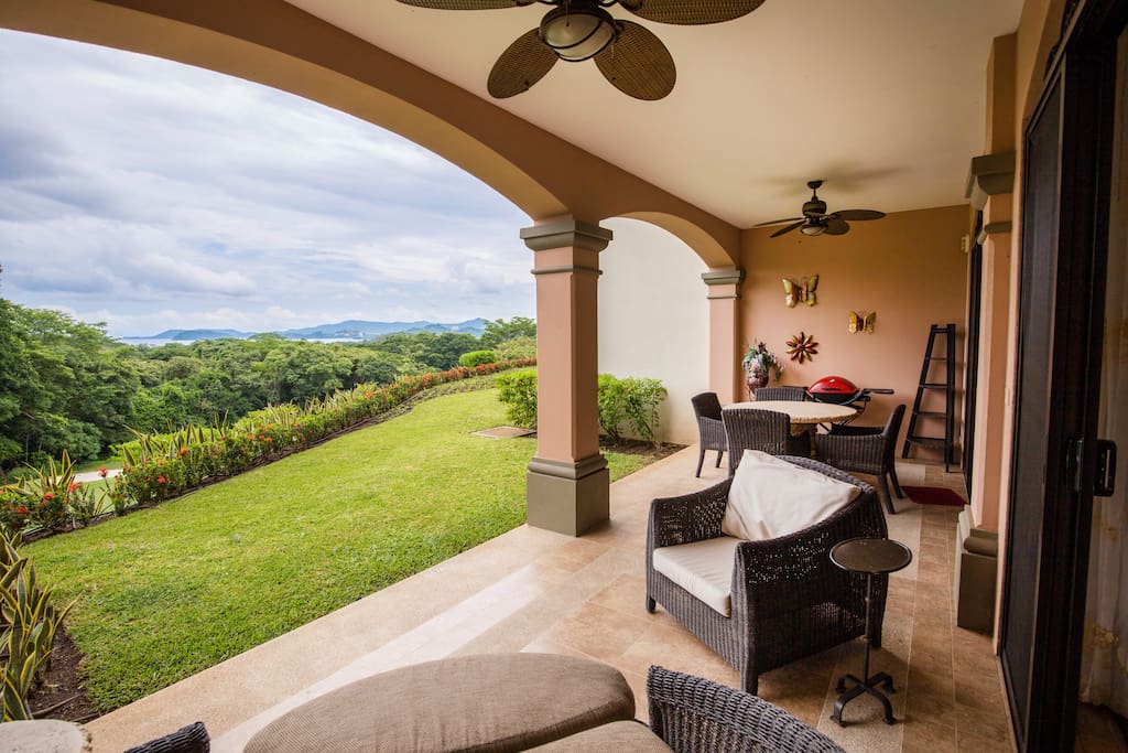 Private patio area with outdoor dining and BBQ