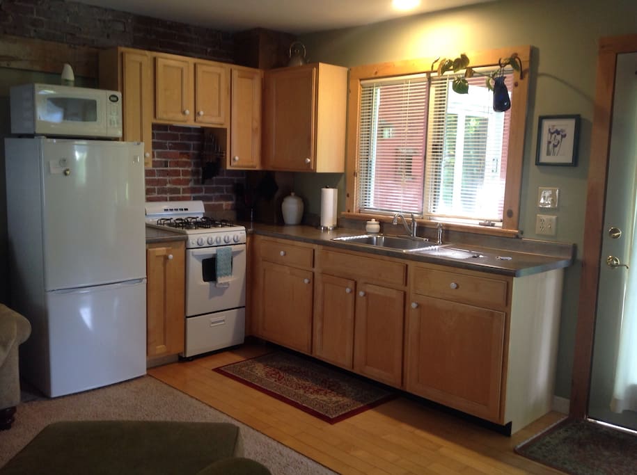 The kitchen is well equipped with dishes, pots & pans, toaster, coffee maker, and if you need anything ask us...we are your neighbors.