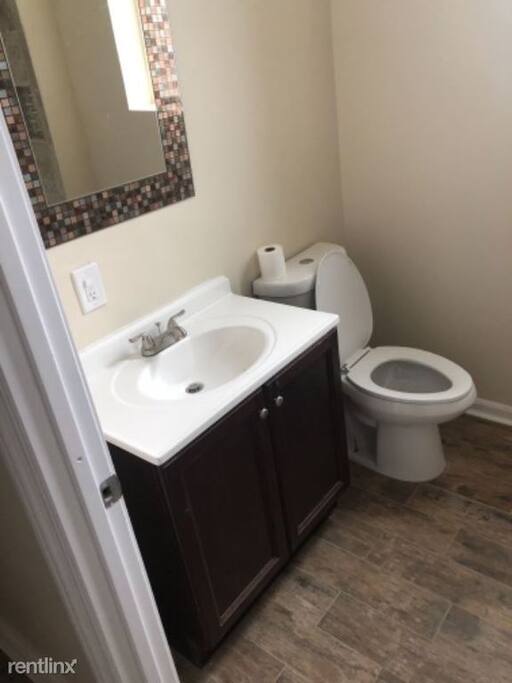 Beautiful wood floors and cabinets. All new fixtures