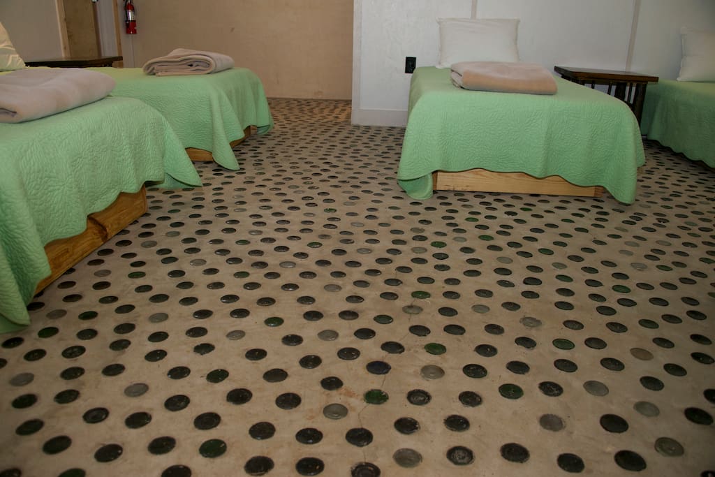 One of the more unique bedroom floors you'll find. Beer bottle floor.