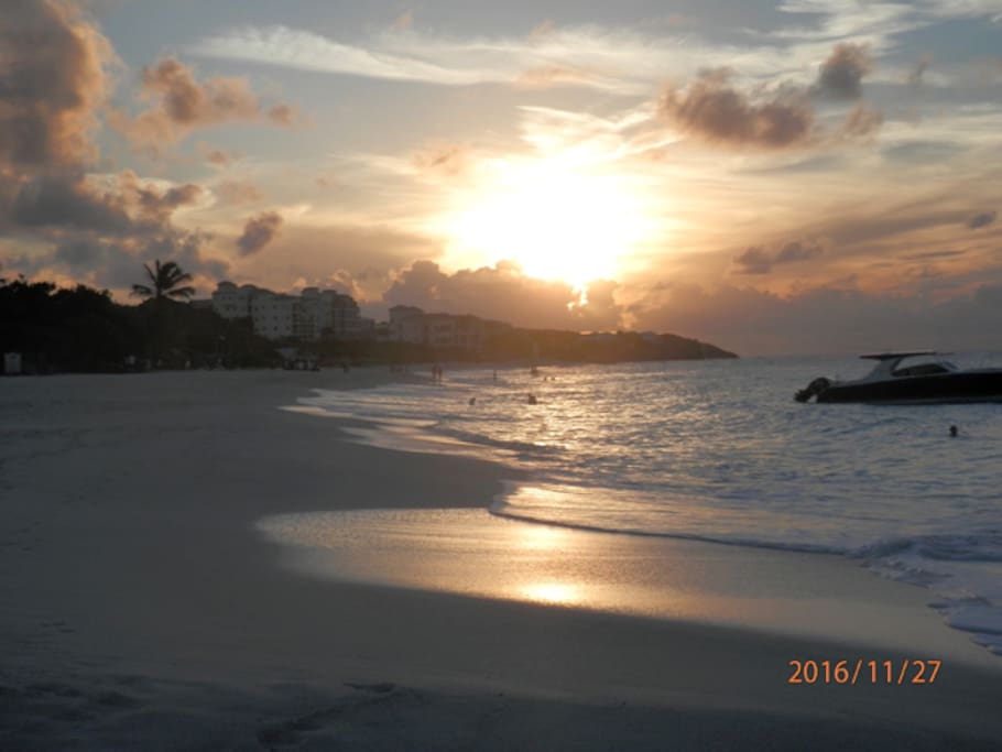 Shoal Bay East at sunset with many bars and restaurants to suit your budget.