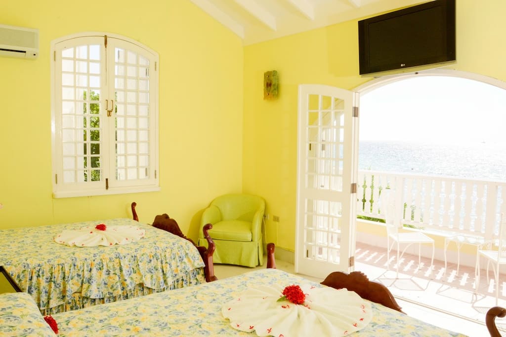 Upstairs bedroom with two double beds