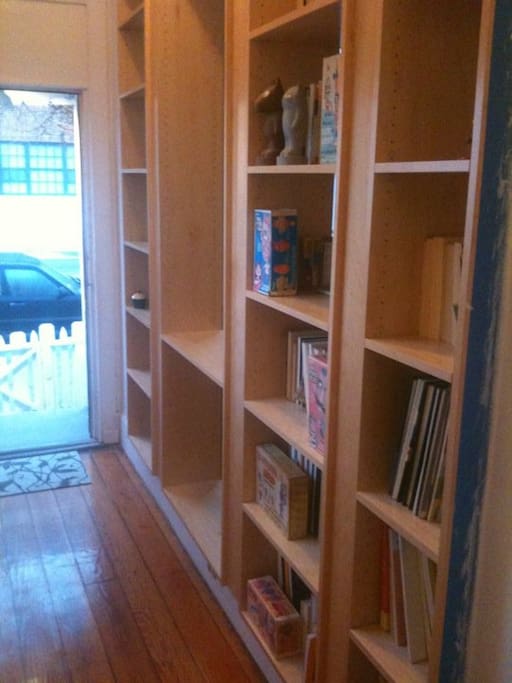 We put in a see-thru bookcase to lets lots of light come through into the living room