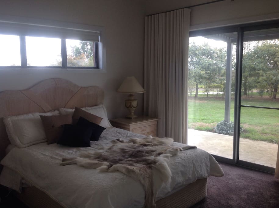 Queen size bedroom with a north- westerly perspective. Great for winter sun.