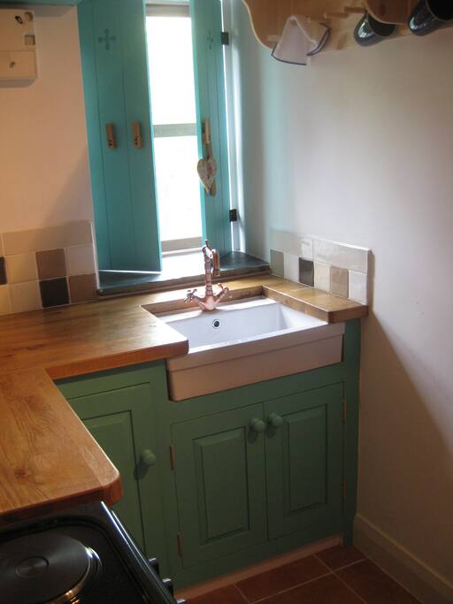 Enjoy preparing a meal or snack in this beautiful kitchen , with stunning views