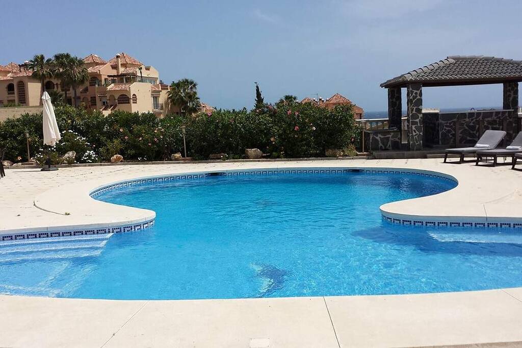 Newly renovated pool and new pool bar (right side)