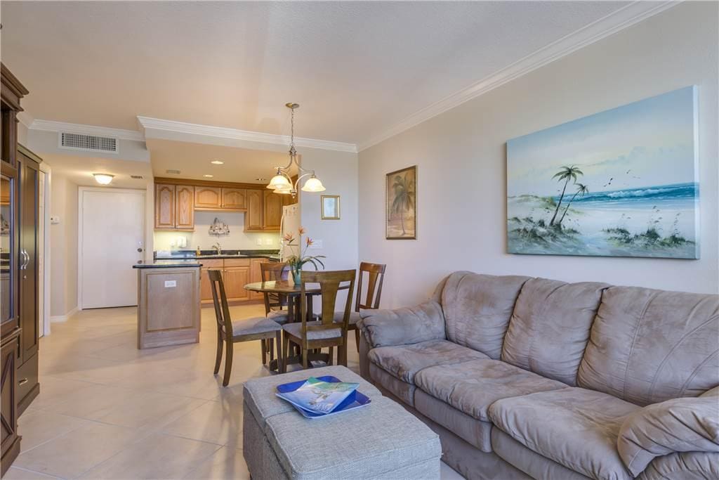 A view of our beautifully furnished living room with a new HDTV - Take a step inside our vacation rental and you'll pick up on a