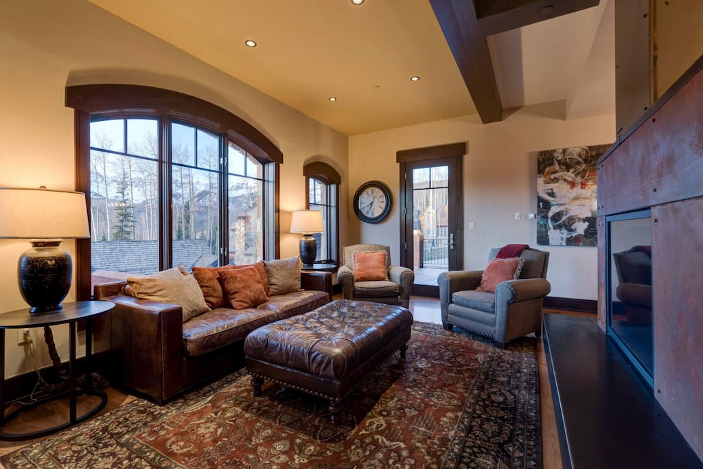 Perhaps face the fireplace, as there is plenty of comfortable seating throughout the living room.