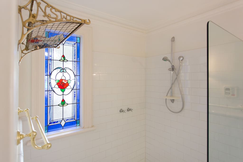 The shower and stained glass window